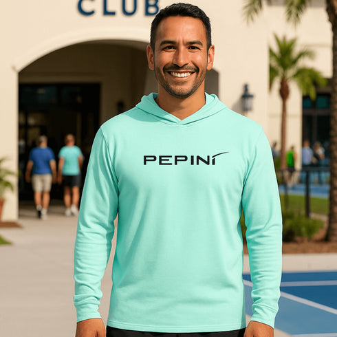 Man wearing a light blue hoodie with 'Pepini' logo in an outdoor setting